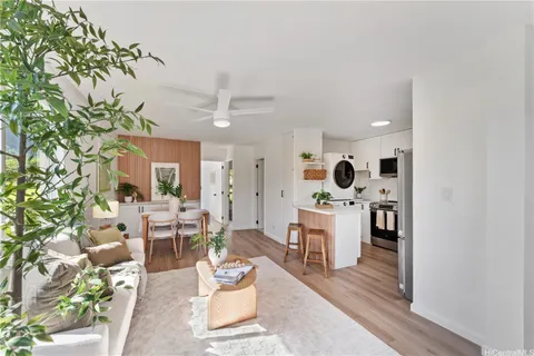 a living room with furniture and a table