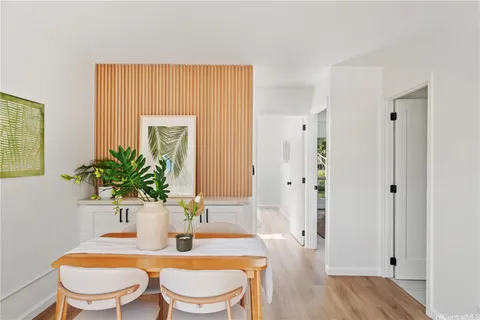 a bathroom with a toilet a sink and a mirror