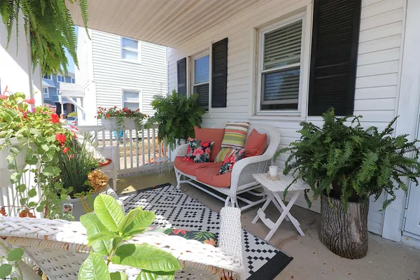 a backyard of a house with seating space