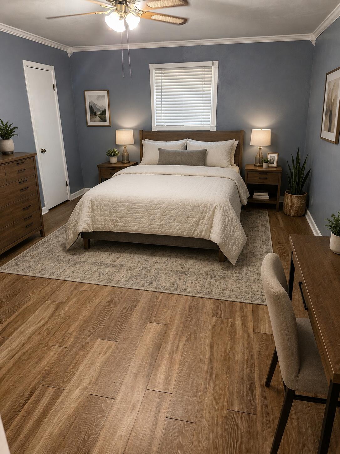 3814 27th Street Lubbock, TX 79410 - Photo 12 of 24 a bedroom with a bed and a lamp