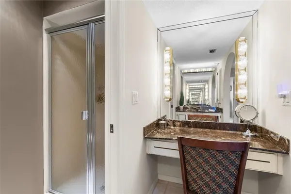 a view of an empty room with a fireplace