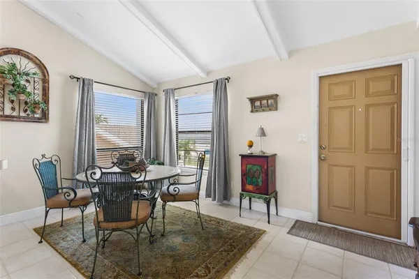 a view of a dining room with furniture