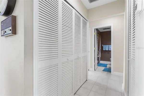 a view of storage and utility room with washer and dryer