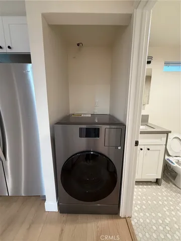 a bathroom with a shower and a toilet