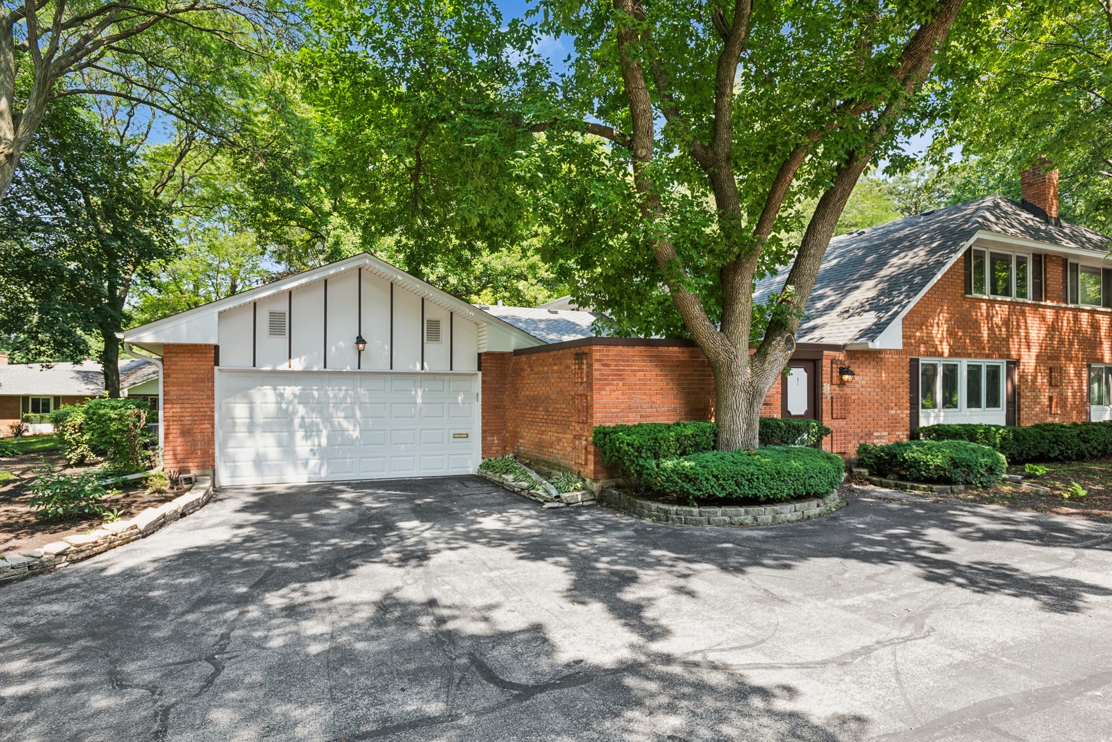 2 Croyden On Duxbury Rolling Meadows, IL 60008 - Photo 1 of 24 a front view of a house with a yard and trees
