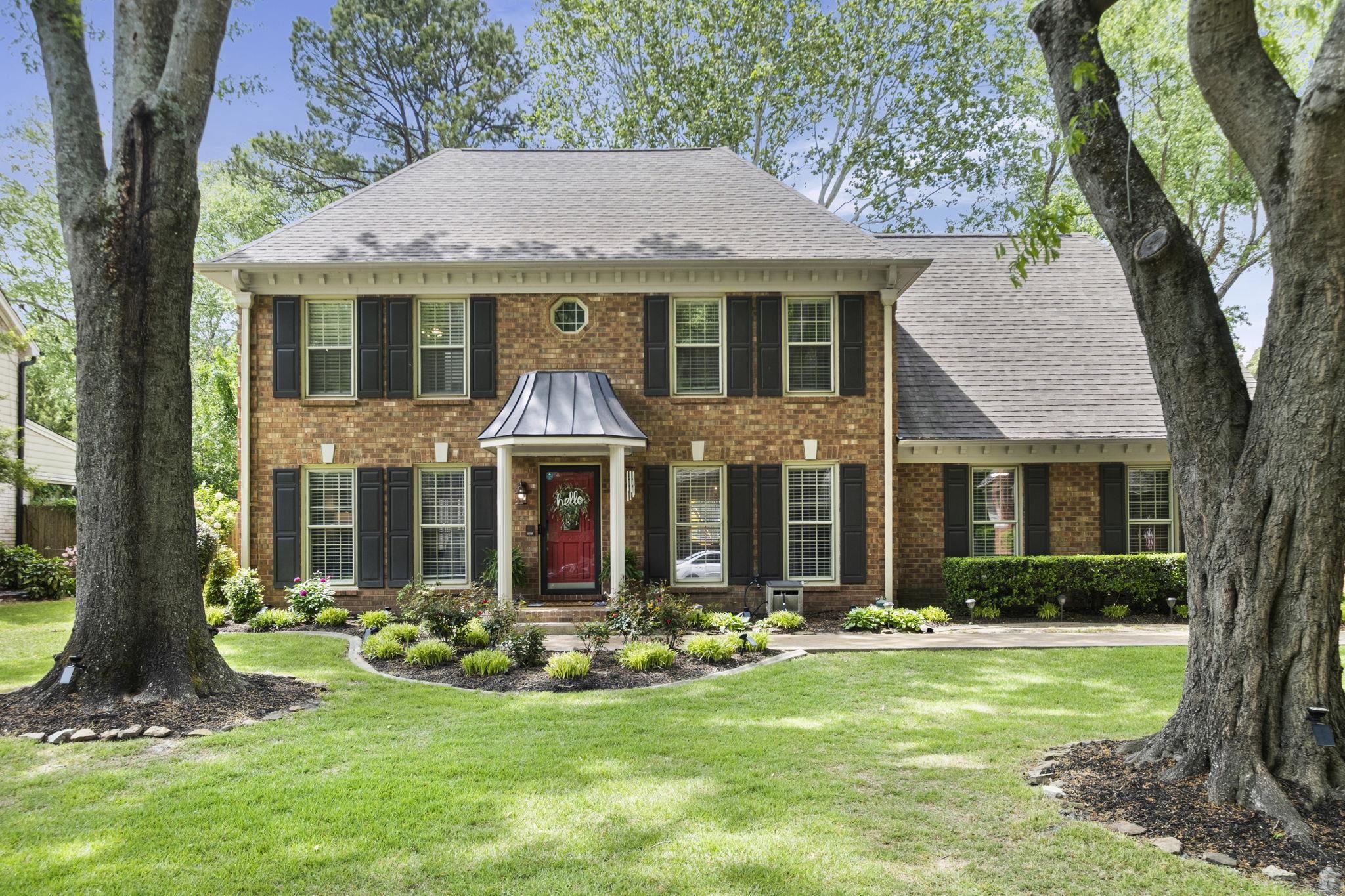 3353 Beaver Run Cove North Collierville, TN 38017 - Photo 1 of 34 a front view of house with yard and green space
