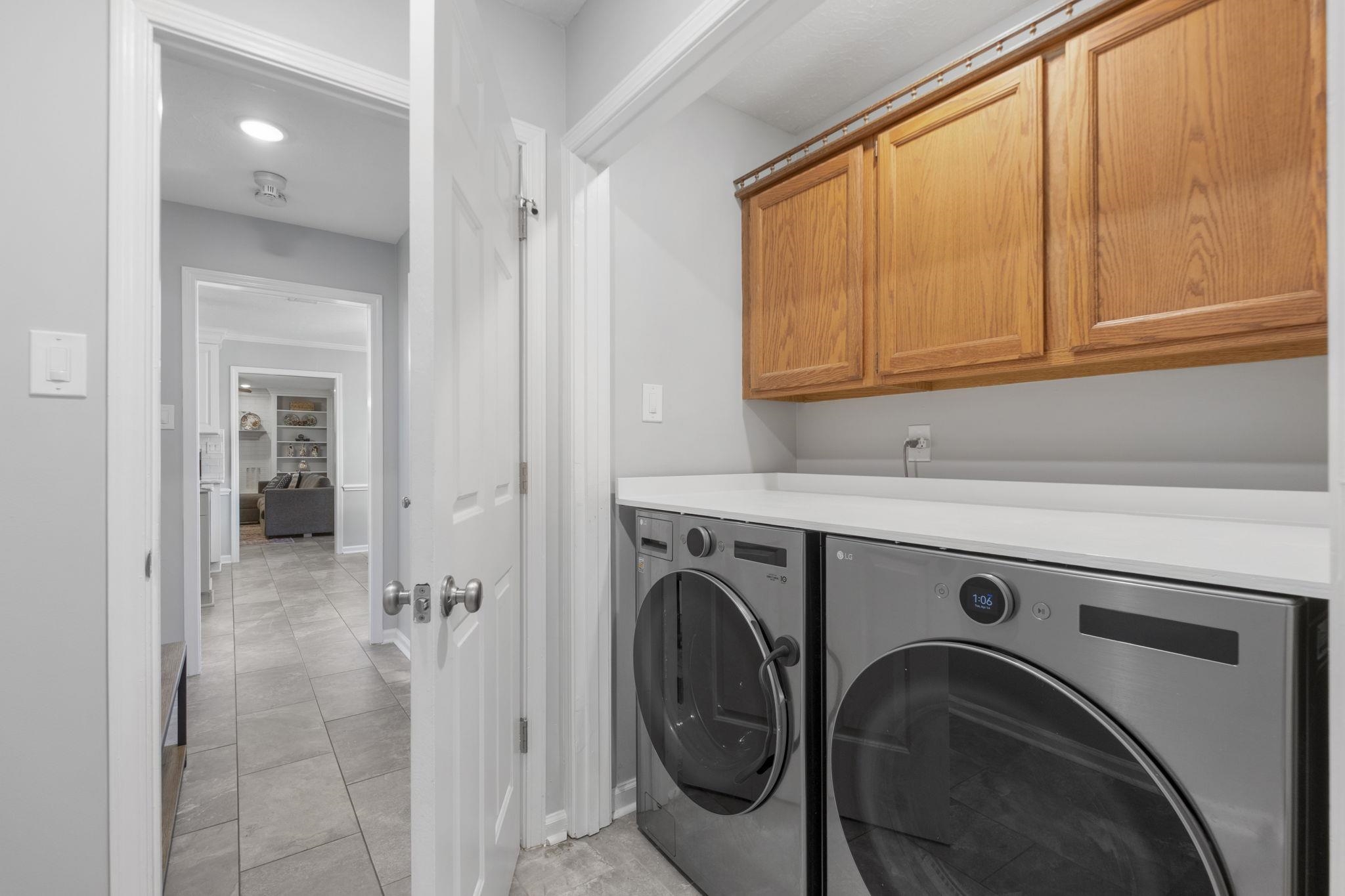 3353 Beaver Run Cove North Collierville, TN 38017 - Photo 18 of 34 a utility room with dryer and washer