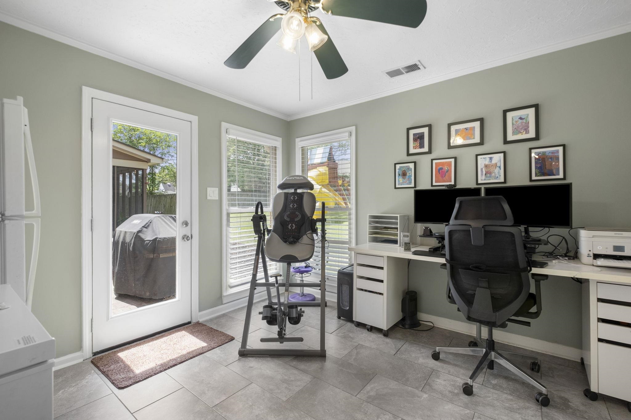 3353 Beaver Run Cove North Collierville, TN 38017 - Photo 19 of 34 a view of a workspace with furniture and a window