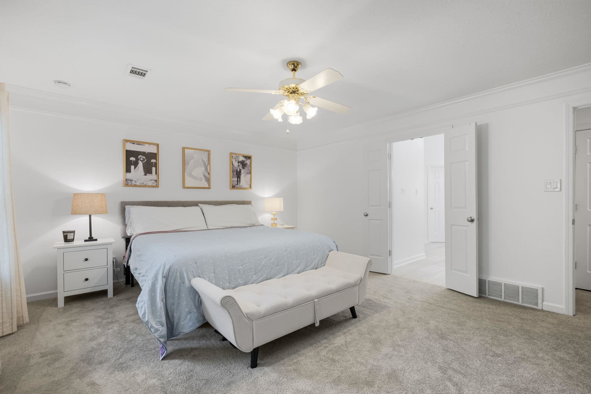 3353 Beaver Run Cove North Collierville, TN 38017 - Photo 20 of 34 a bedroom with a bed and a chandelier
