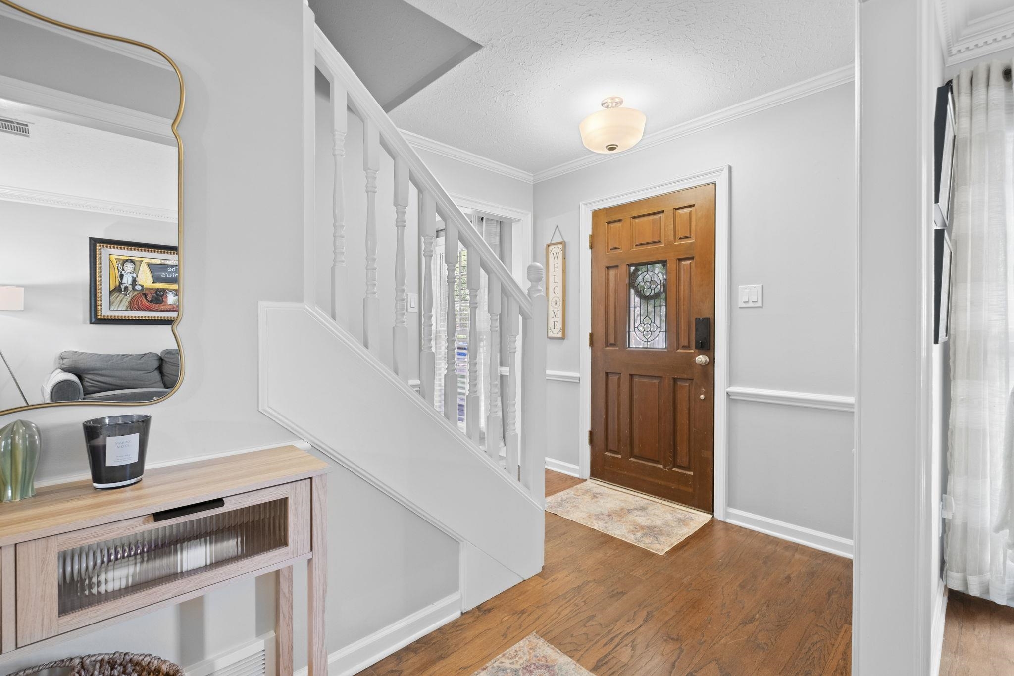 3353 Beaver Run Cove North Collierville, TN 38017 - Photo 4 of 34 a view of a hallway with wooden floor and entryway
