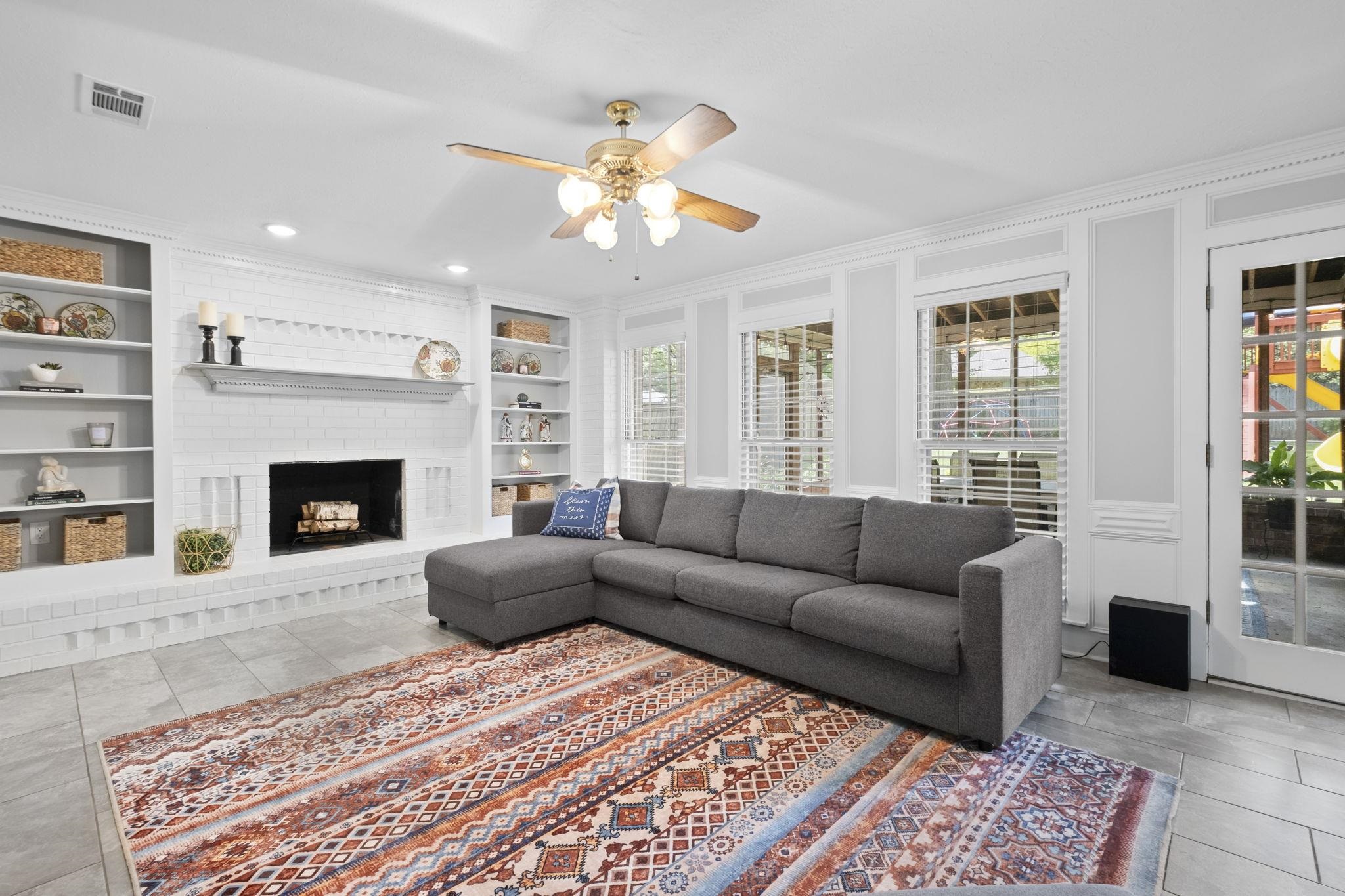 3353 Beaver Run Cove North Collierville, TN 38017 - Photo 8 of 34 a living room with furniture and a fireplace