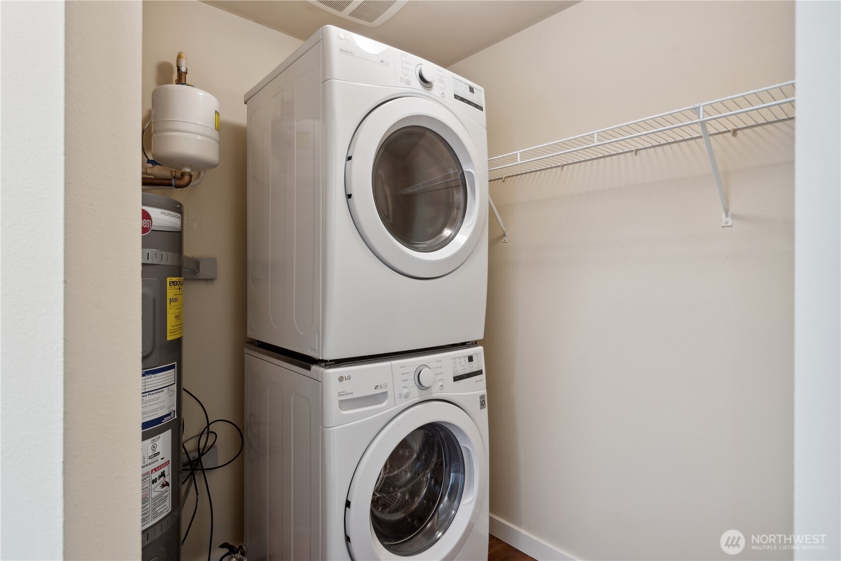108 5th Avenue South, Unit 506 Seattle, WA 98104 - Photo 16 of 17 a utility room with dryer and washer