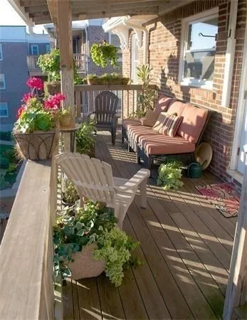 a view of a chairs and table in a patio
