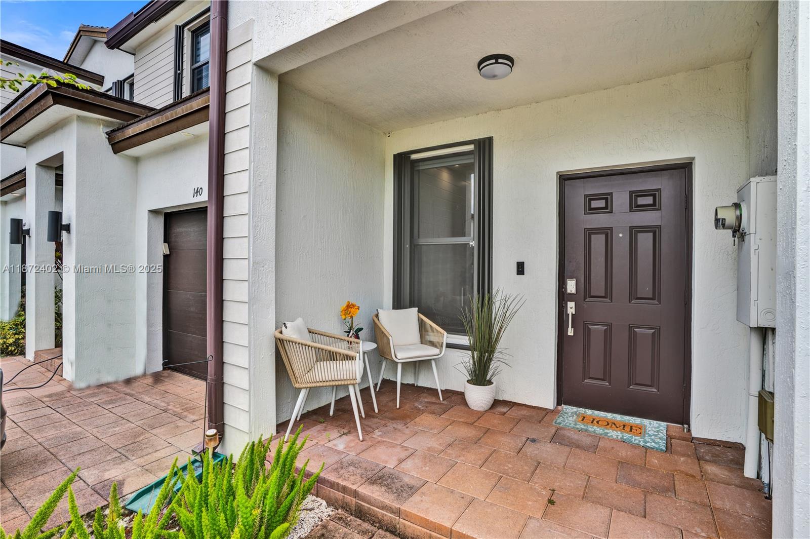 136 Southwest 185th Way Pembroke Pines, FL 33029 - Photo 2 of 48 a view of an outdoor space with seating area