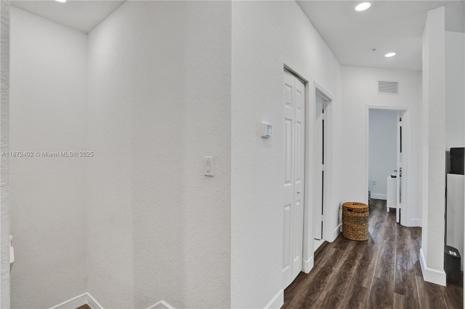 136 Southwest 185th Way Pembroke Pines, FL 33029 - Photo 40 of 48 a view of a hallway with a hardwood floor