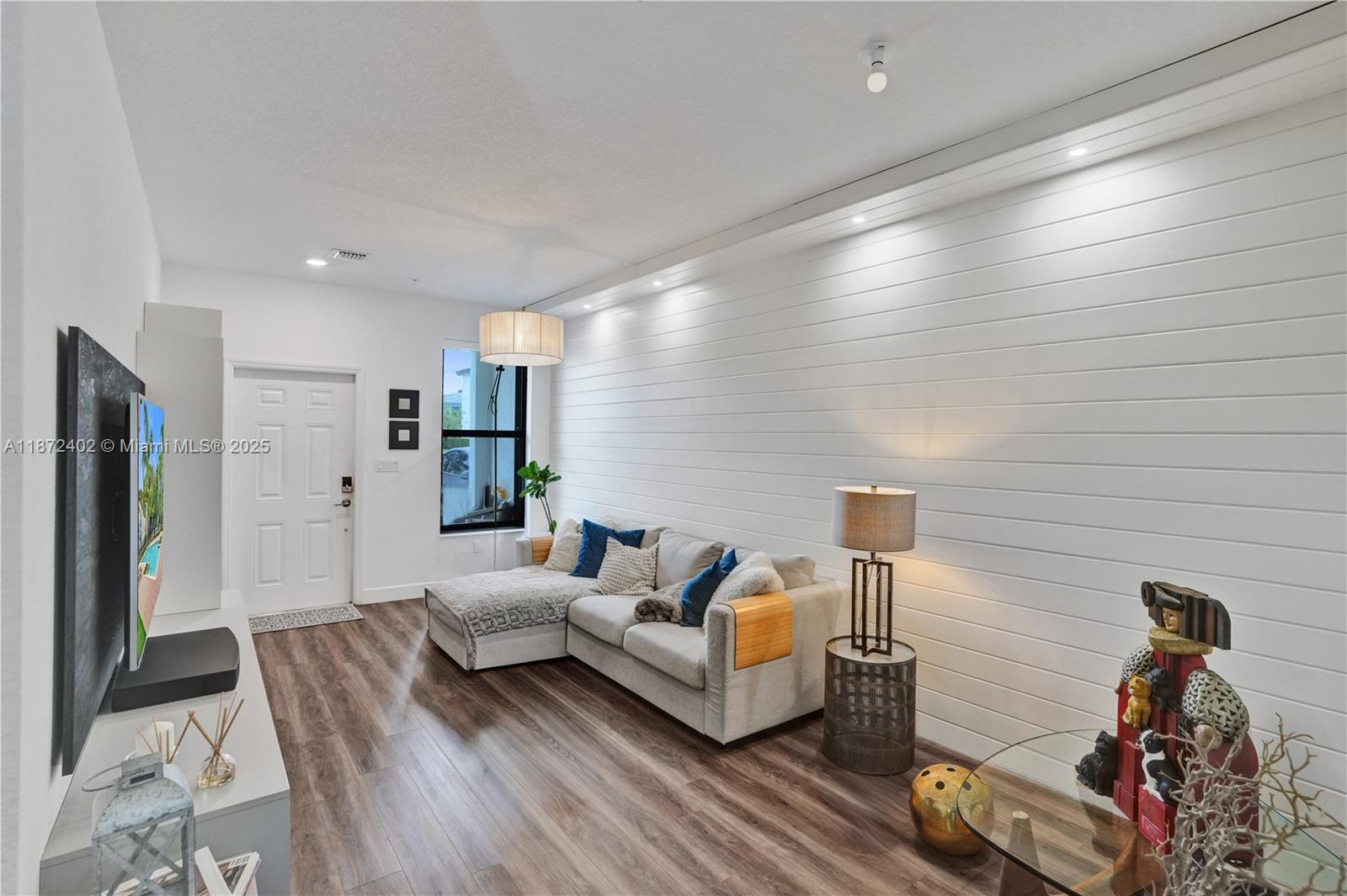 136 Southwest 185th Way Pembroke Pines, FL 33029 - Photo 4 of 48 a living room with furniture