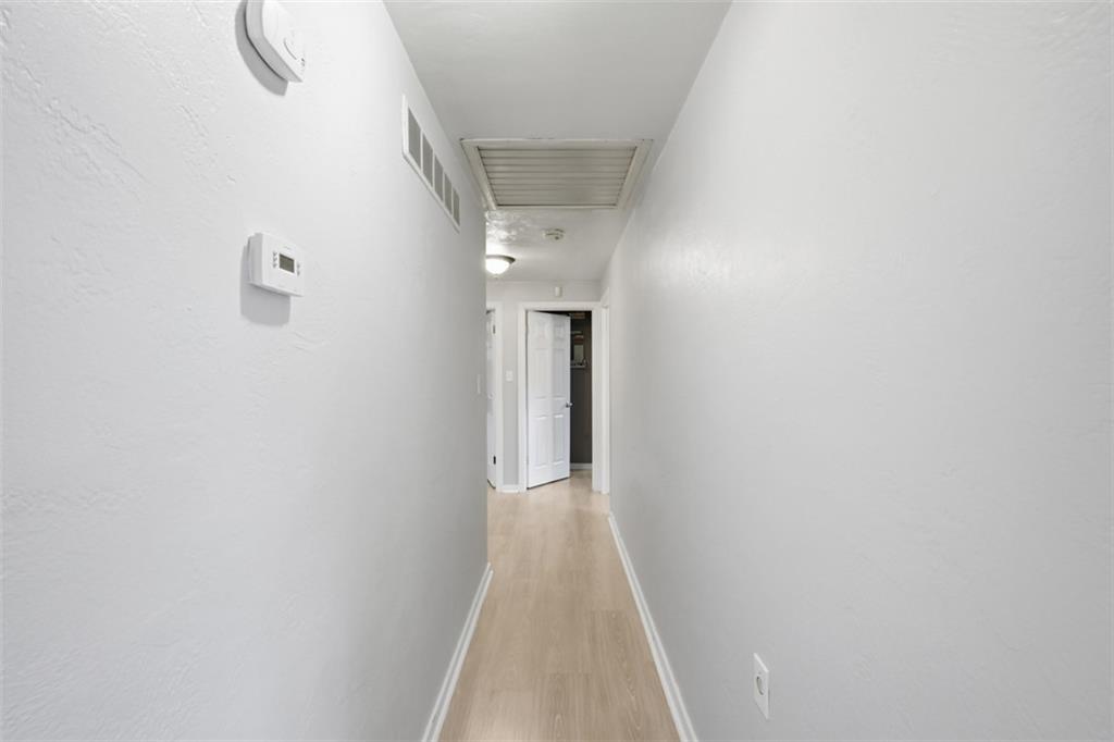 2386 Crestview Road Pittsburgh, PA 15216 - Photo 16 of 48 a view of a hallway with wooden floor