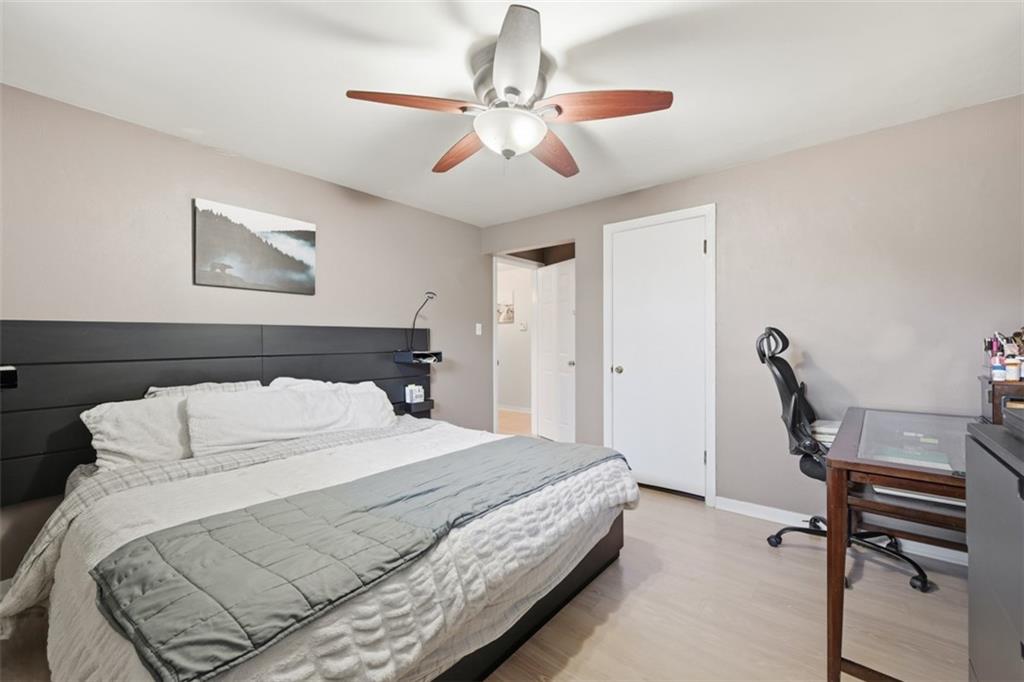 2386 Crestview Road Pittsburgh, PA 15216 - Photo 20 of 48 a bedroom with a bed and a chandelier