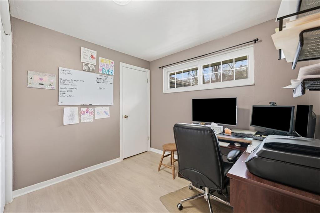 2386 Crestview Road Pittsburgh, PA 15216 - Photo 23 of 48 a view of a workspace with furniture and a window