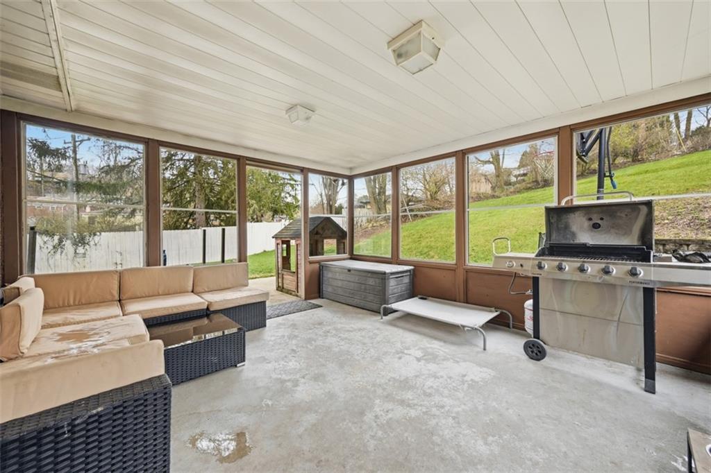 2386 Crestview Road Pittsburgh, PA 15216 - Photo 36 of 48 a living room with furniture and large windows
