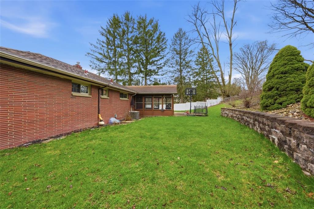 2386 Crestview Road Pittsburgh, PA 15216 - Photo 41 of 48 a view of a house with backyard and a tree