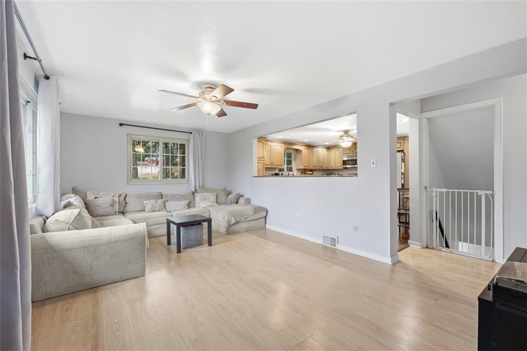 2386 Crestview Road Pittsburgh, PA 15216 - Photo 8 of 48 a living room with furniture and a ceiling fan