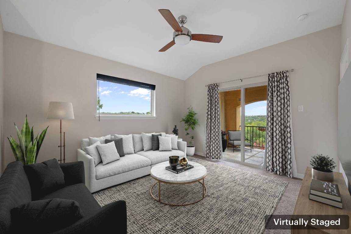 5715 Misty Hill Cove Austin, TX 78759 - Photo 16 of 40 a living room with furniture and a large window