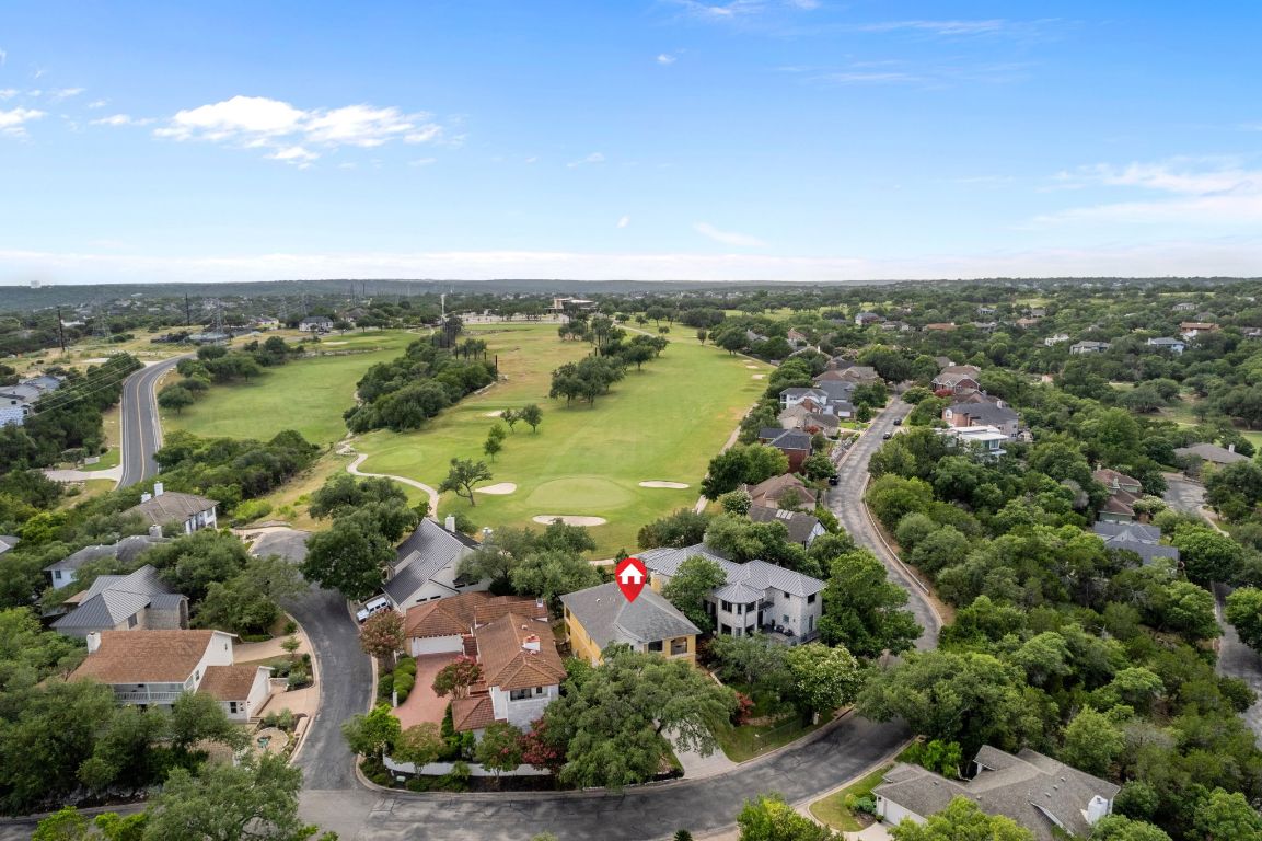5715 Misty Hill Cove Austin, TX 78759 - Photo 2 of 40 an aerial view of lake and residential houses with outdoor space