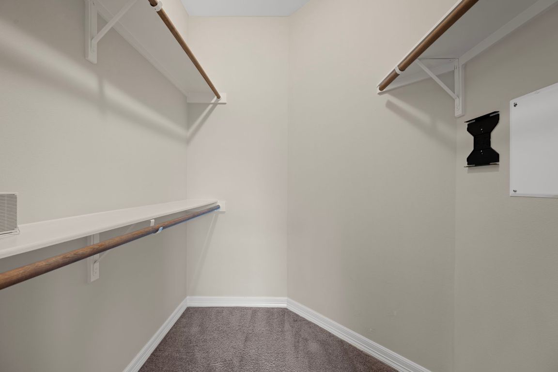 5715 Misty Hill Cove Austin, TX 78759 - Photo 21 of 40 a view of small space with racks on the wall