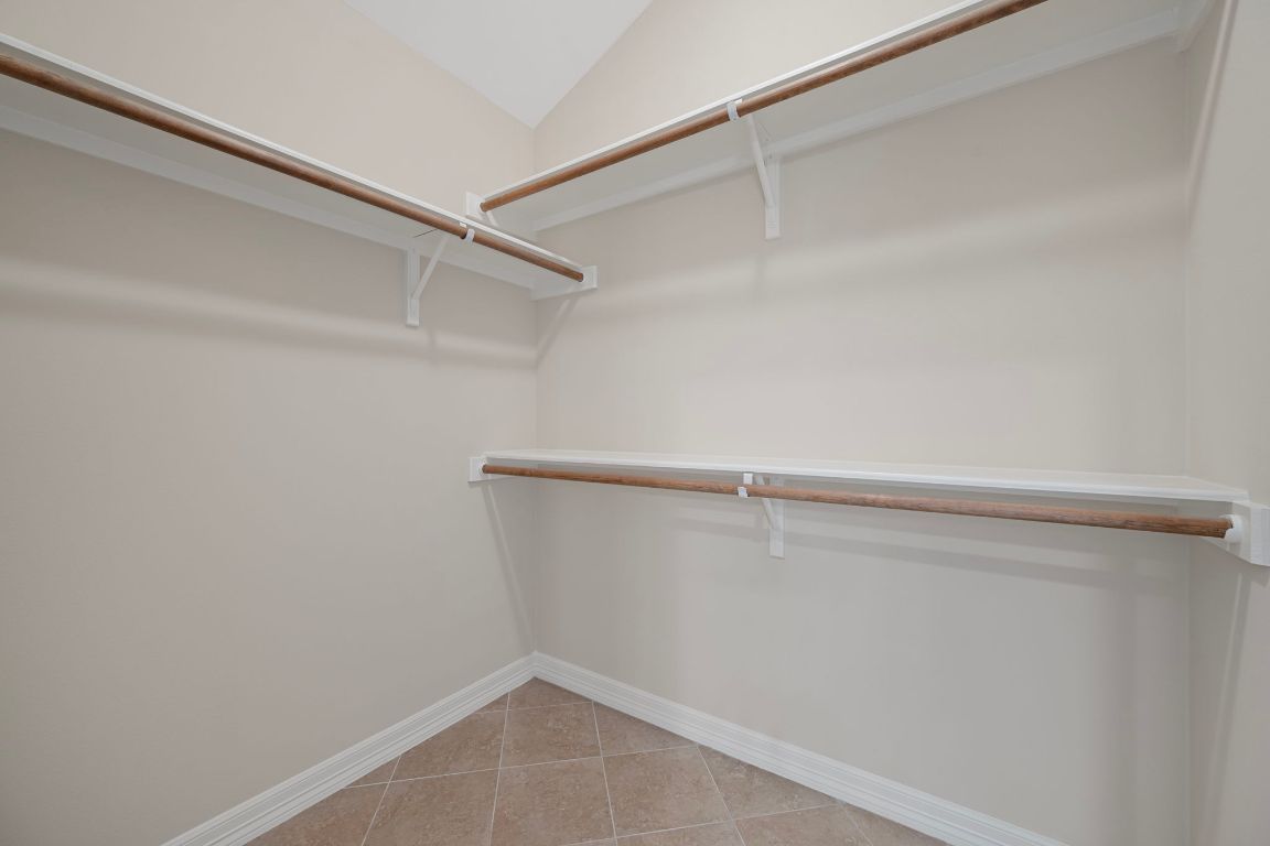 5715 Misty Hill Cove Austin, TX 78759 - Photo 24 of 40 a view of an empty walk in closet