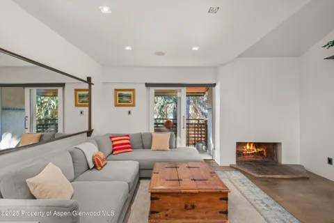 a living room with furniture and a couch