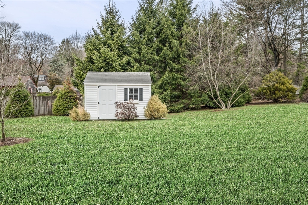 16 Warner Road Ipswich, MA 01938 - Photo 40 of 42 a white house that has a tree in it