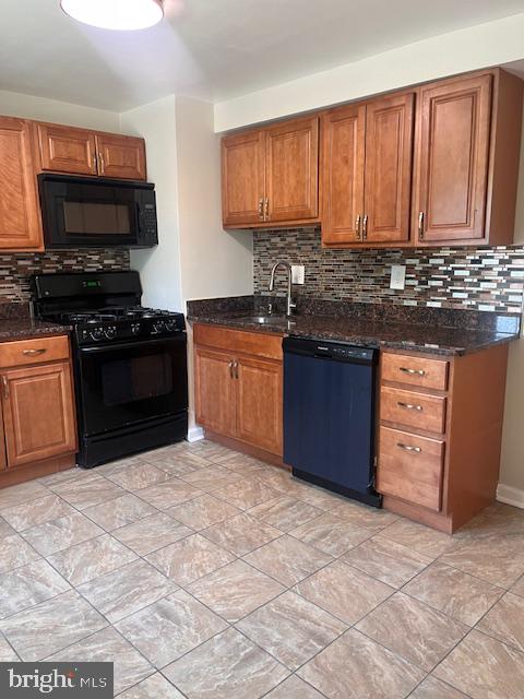 1232 Palmer Road, Unit 111 Fort Washington, MD 20744 - Photo 8 of 45 a kitchen with stainless steel appliances granite countertop a stove sink and cabinets