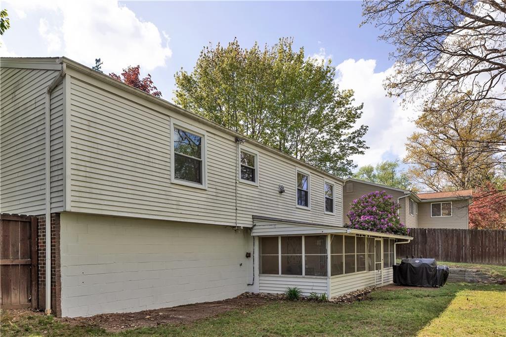 645 Blue Ridge Road Pittsburgh, PA 15239 - Photo 25 of 27 a view of house with a yard