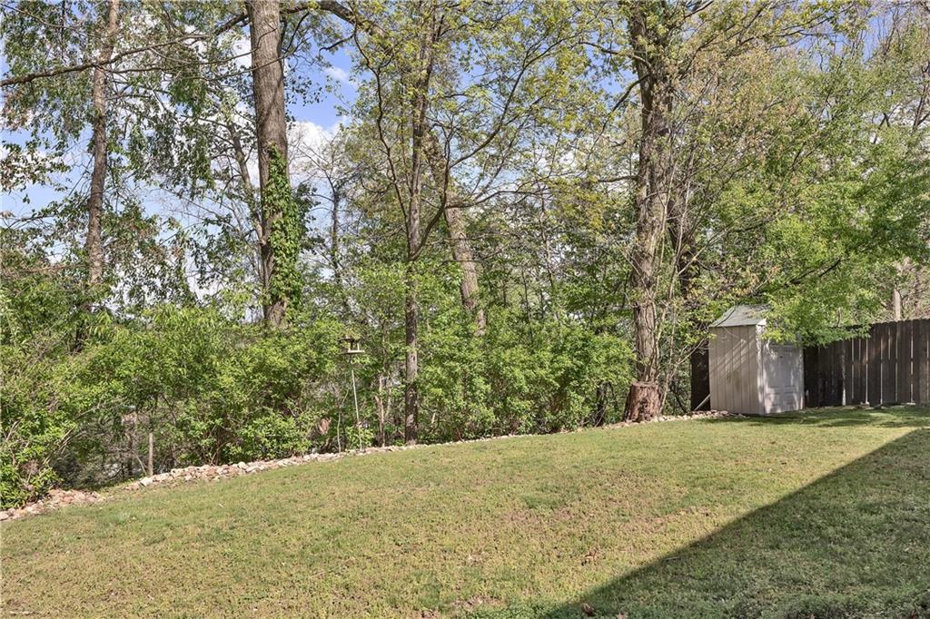 645 Blue Ridge Road Pittsburgh, PA 15239 - Photo 26 of 27 a view of a yard with large trees
