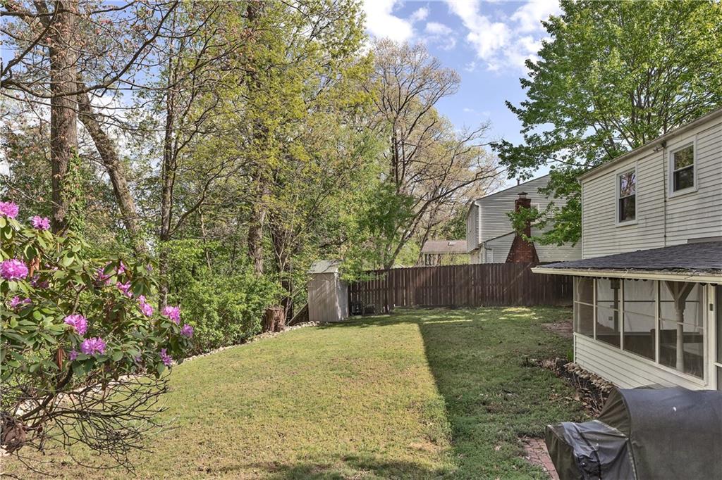 645 Blue Ridge Road Pittsburgh, PA 15239 - Photo 27 of 27 a view of a backyard with large trees and plants