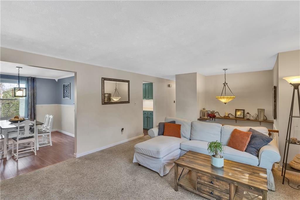 645 Blue Ridge Road Pittsburgh, PA 15239 - Photo 4 of 27 a living room with furniture