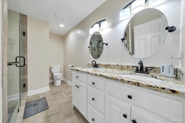 a kitchen with stainless steel appliances a refrigerator and a stove top oven