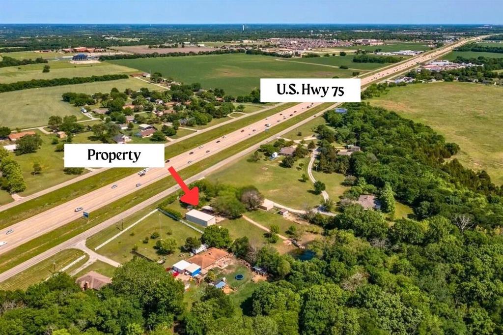14329 Highway 75 Van Alstyne, TX 75495 - Photo 1 of 2 a view of a city