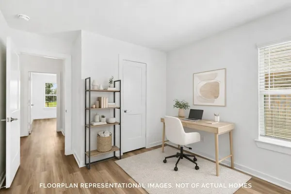 a bathroom with a sink toilet and a mirror