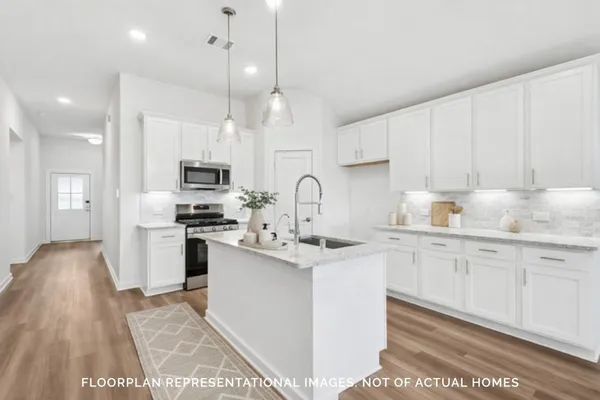a bath room with a shower and a sink