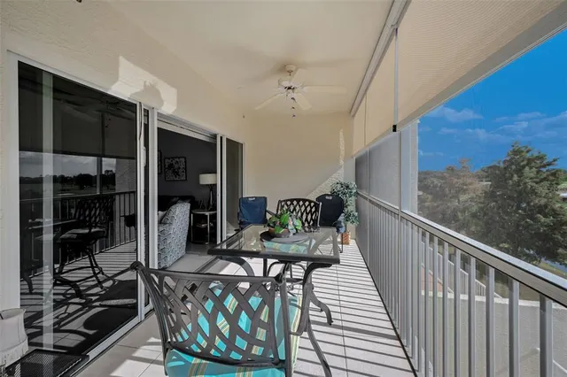 a view of a building with entryway and a garage