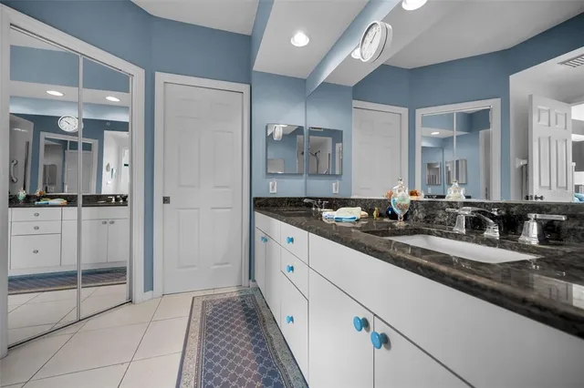 a front view of a building with a yard