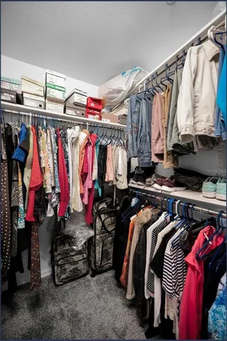 a view of a lake with houses in the back