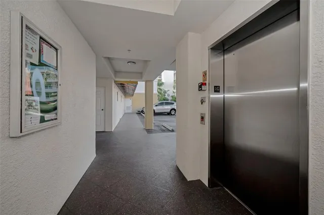 a kitchen with a sink a stove and cabinets