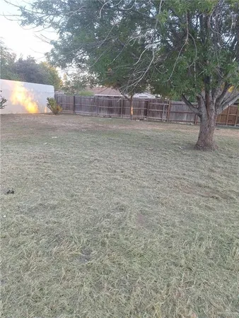 a view of a yard with an outdoor space