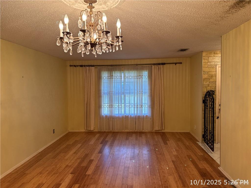 421 Longshadow Road Laredo, TX 78041 - Photo 4 of 13 a view of a room with wooden floor
