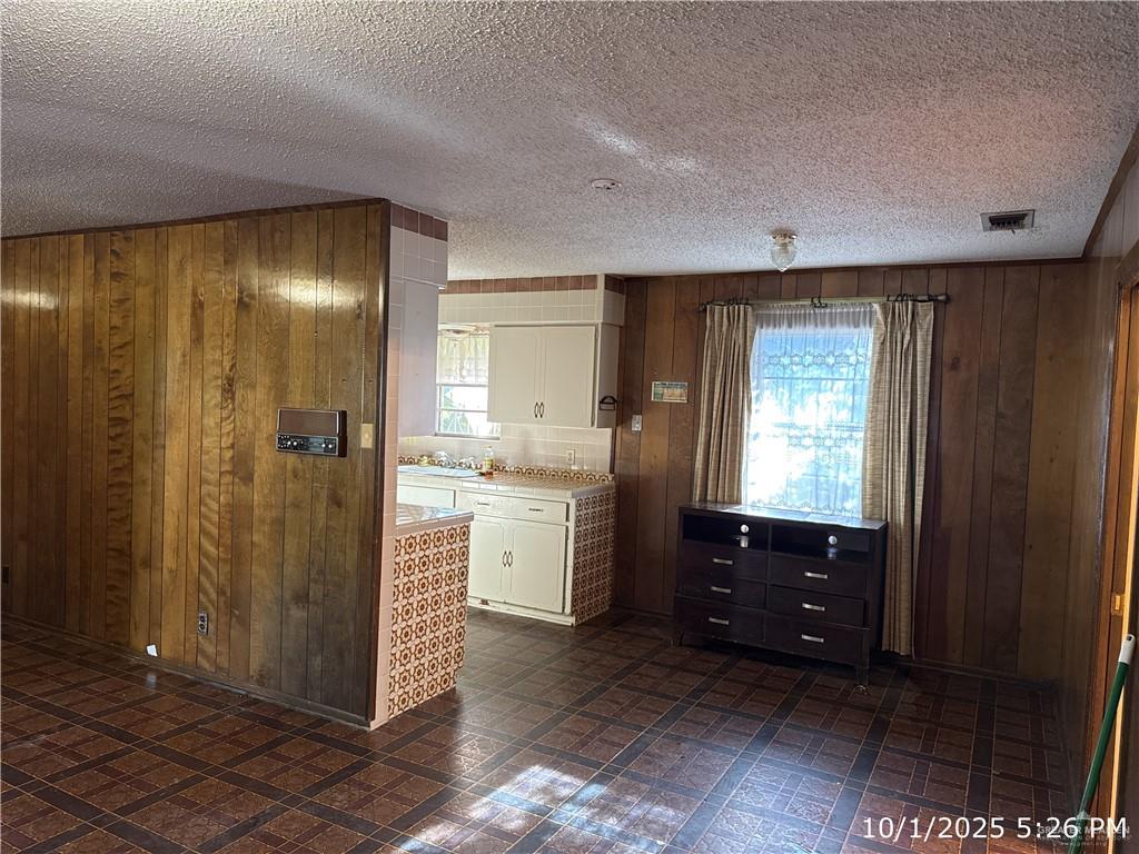 421 Longshadow Road Laredo, TX 78041 - Photo 9 of 13 a bathroom with a double vanity sink a toilet and shower