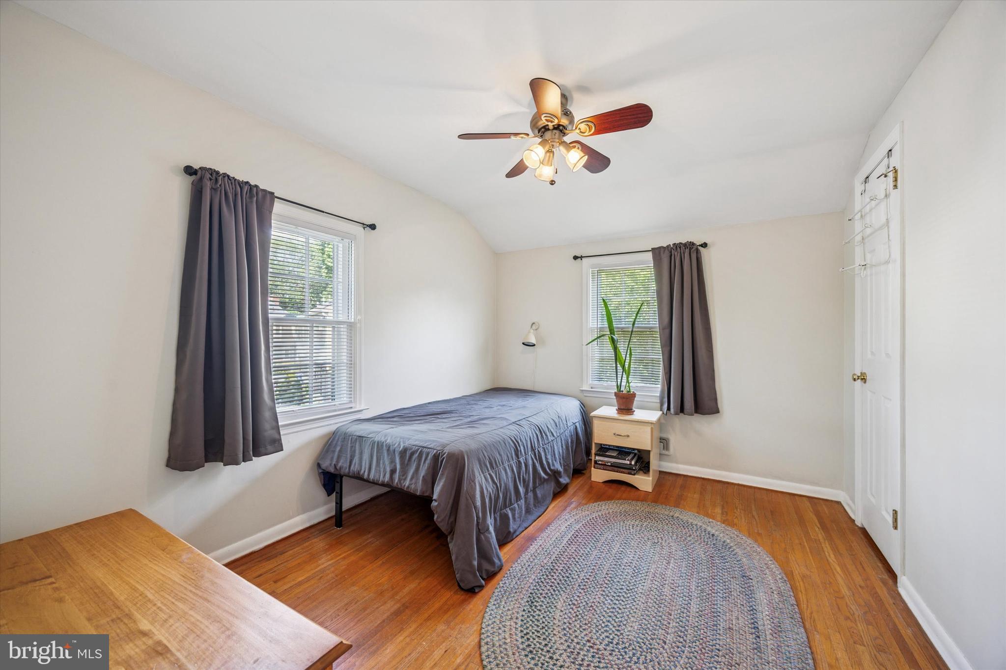 111 Wayside Drive Cherry Hill, NJ 08034 - Photo 14 of 28 a bedroom with a bed and a chandelier