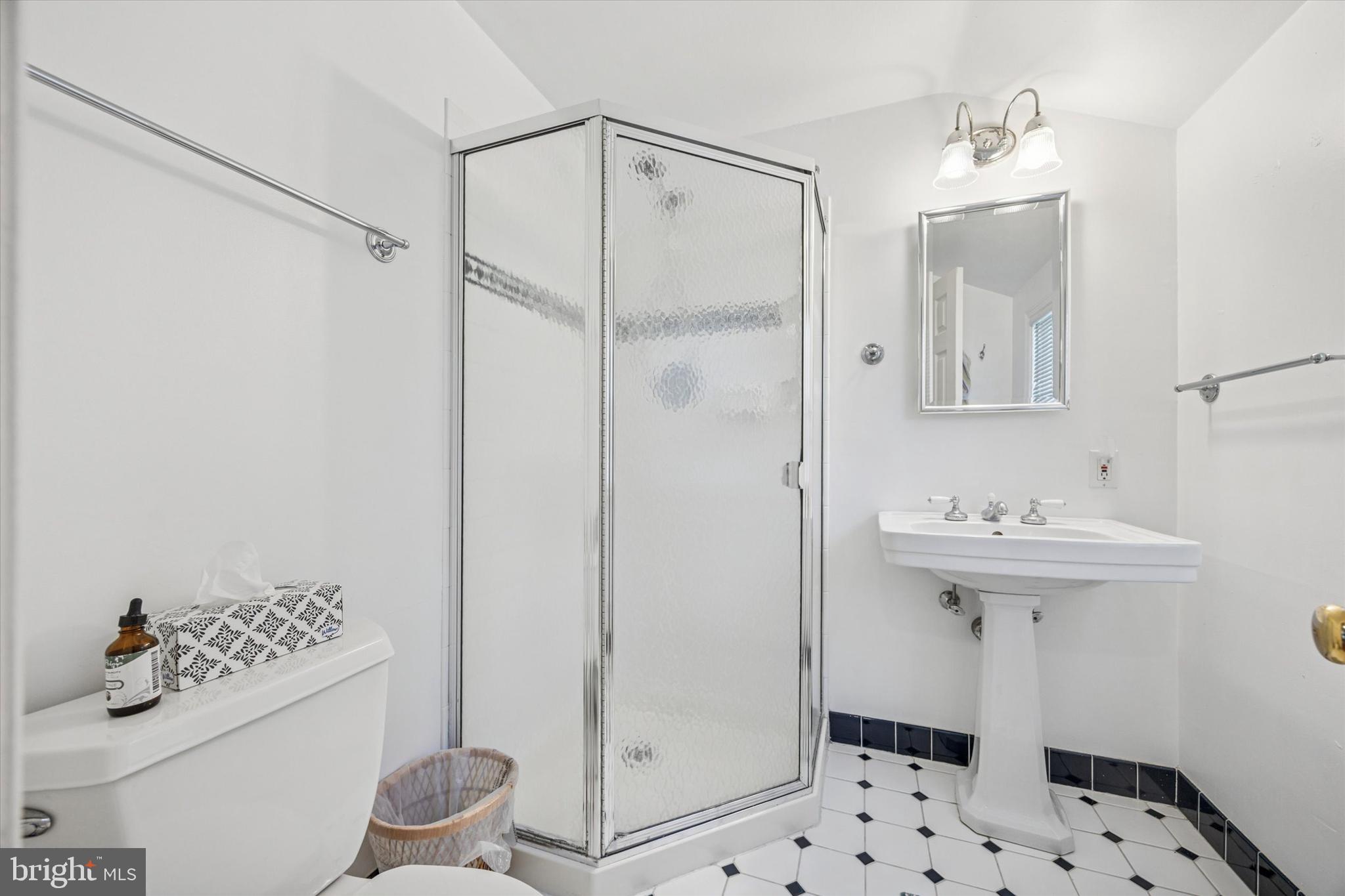 111 Wayside Drive Cherry Hill, NJ 08034 - Photo 19 of 28 a bathroom with a sink a toilet and shower